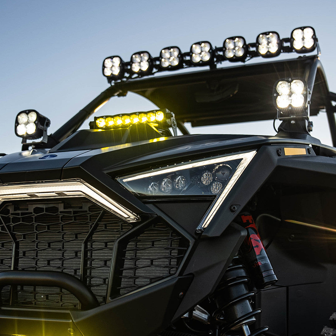 Baja Designs Polaris RZR Pro R XL Sport A-Pillar Light Kit mounted on off-road vehicle with bright LED lights