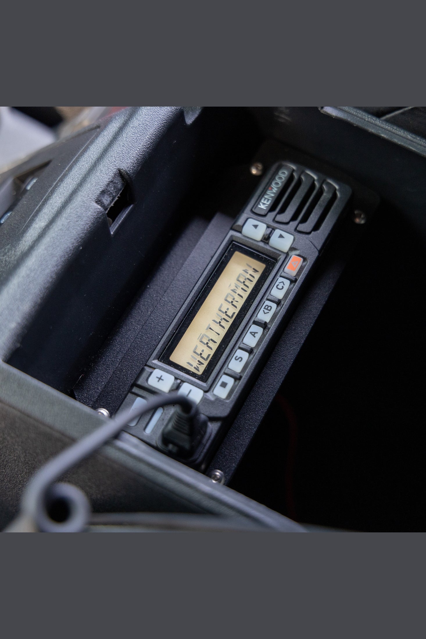 Sleek Integration: Ford Bronco Radio Console Bracket for Kenwood NX-1700 and Icom F5021