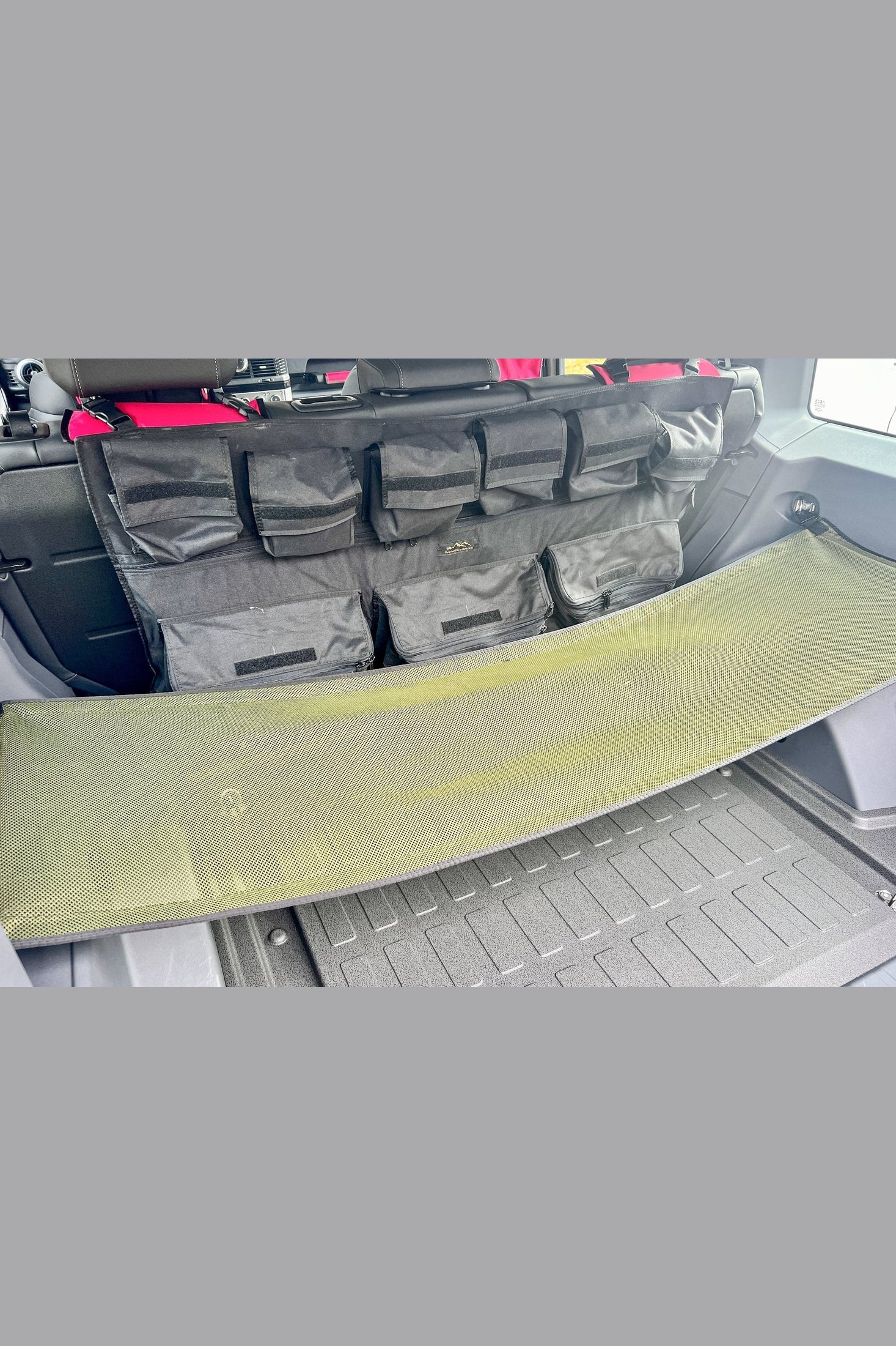 Organize Your Gear with INEOS Grenadier Cargo Nets - Keep Your Vehicle Tidy and Ready for Adventure