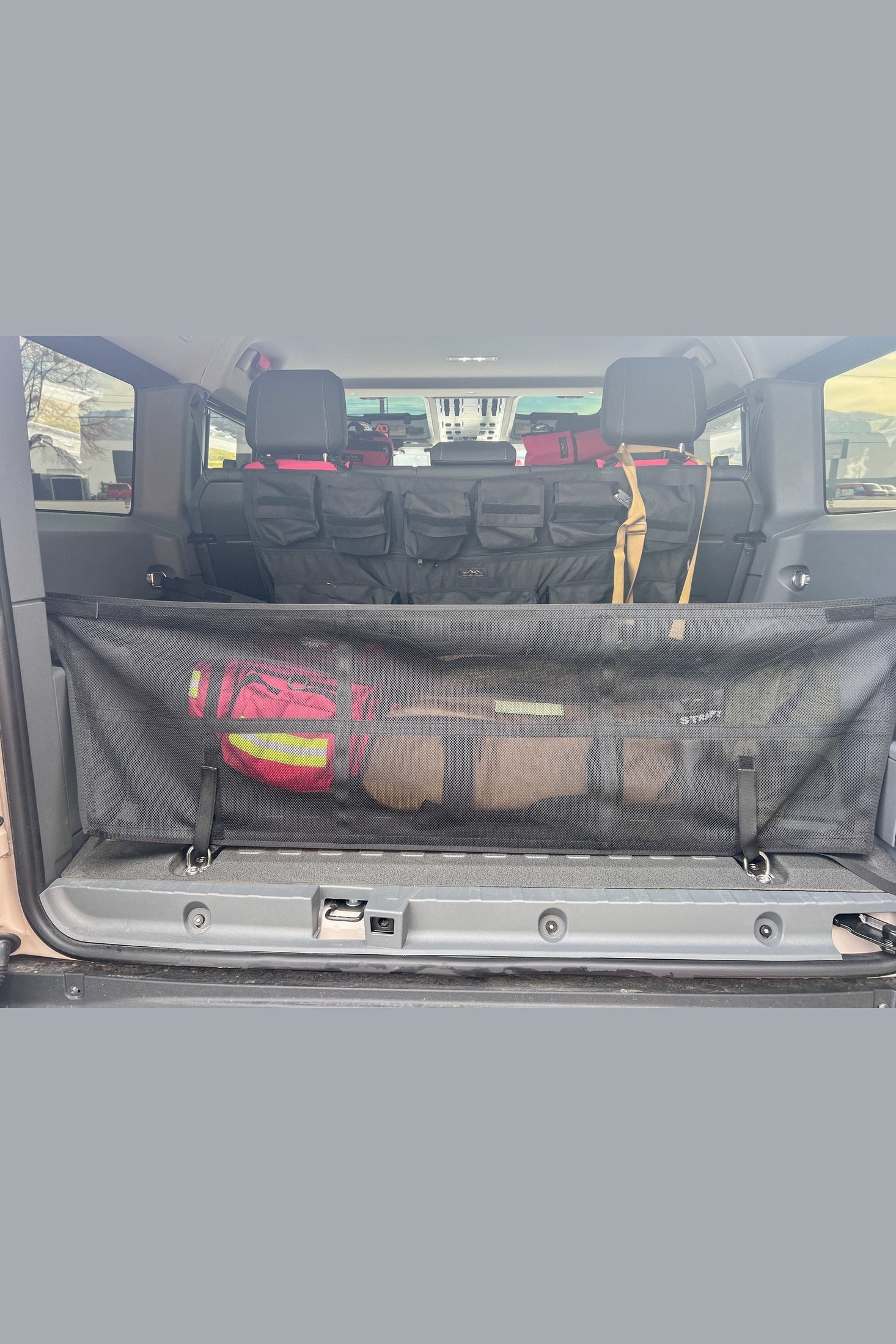 Organize Your Gear with INEOS Grenadier Cargo Nets - Keep Your Vehicle Tidy and Ready for Adventure