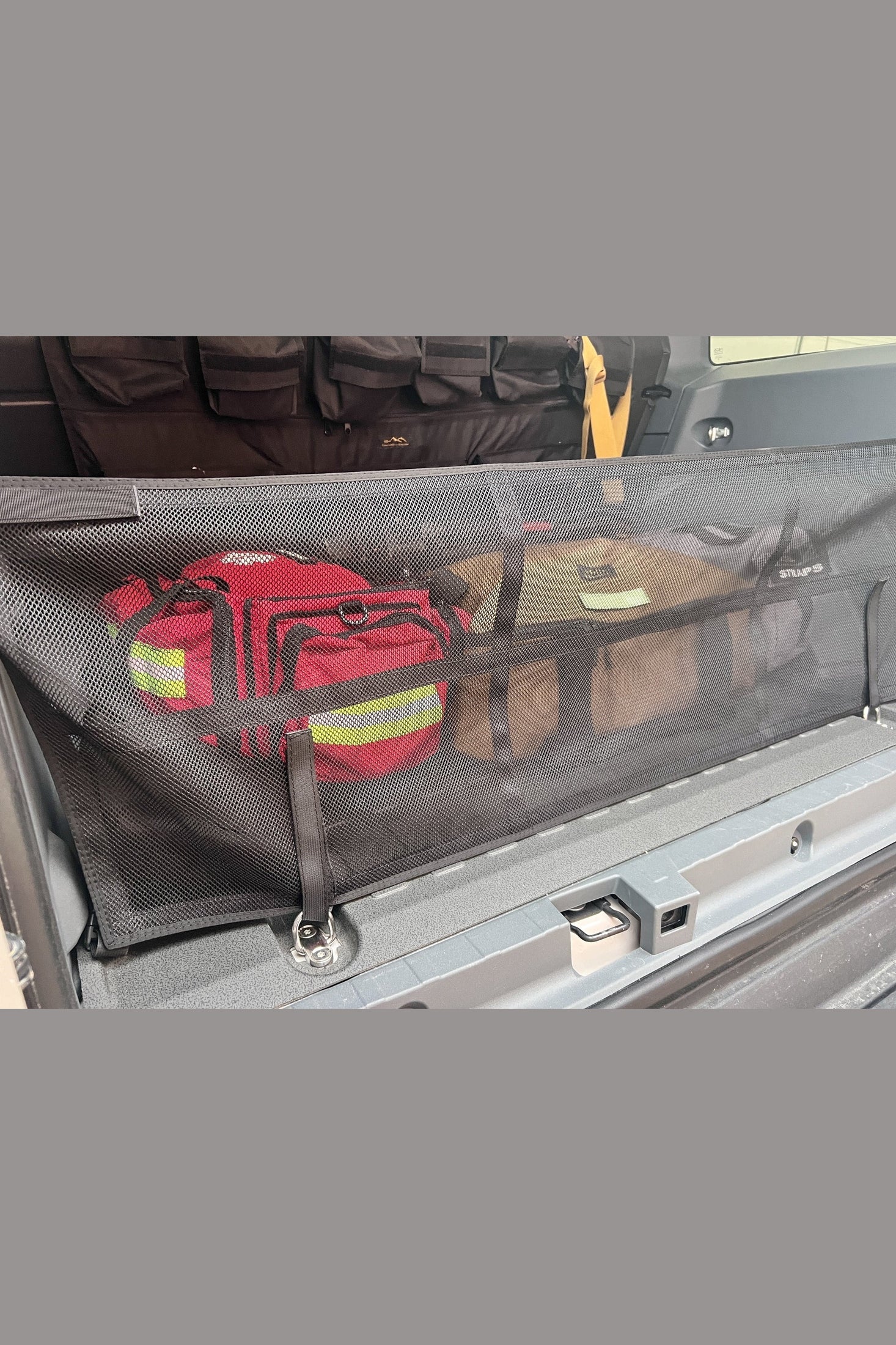 Organize Your Gear with INEOS Grenadier Cargo Nets - Keep Your Vehicle Tidy and Ready for Adventure