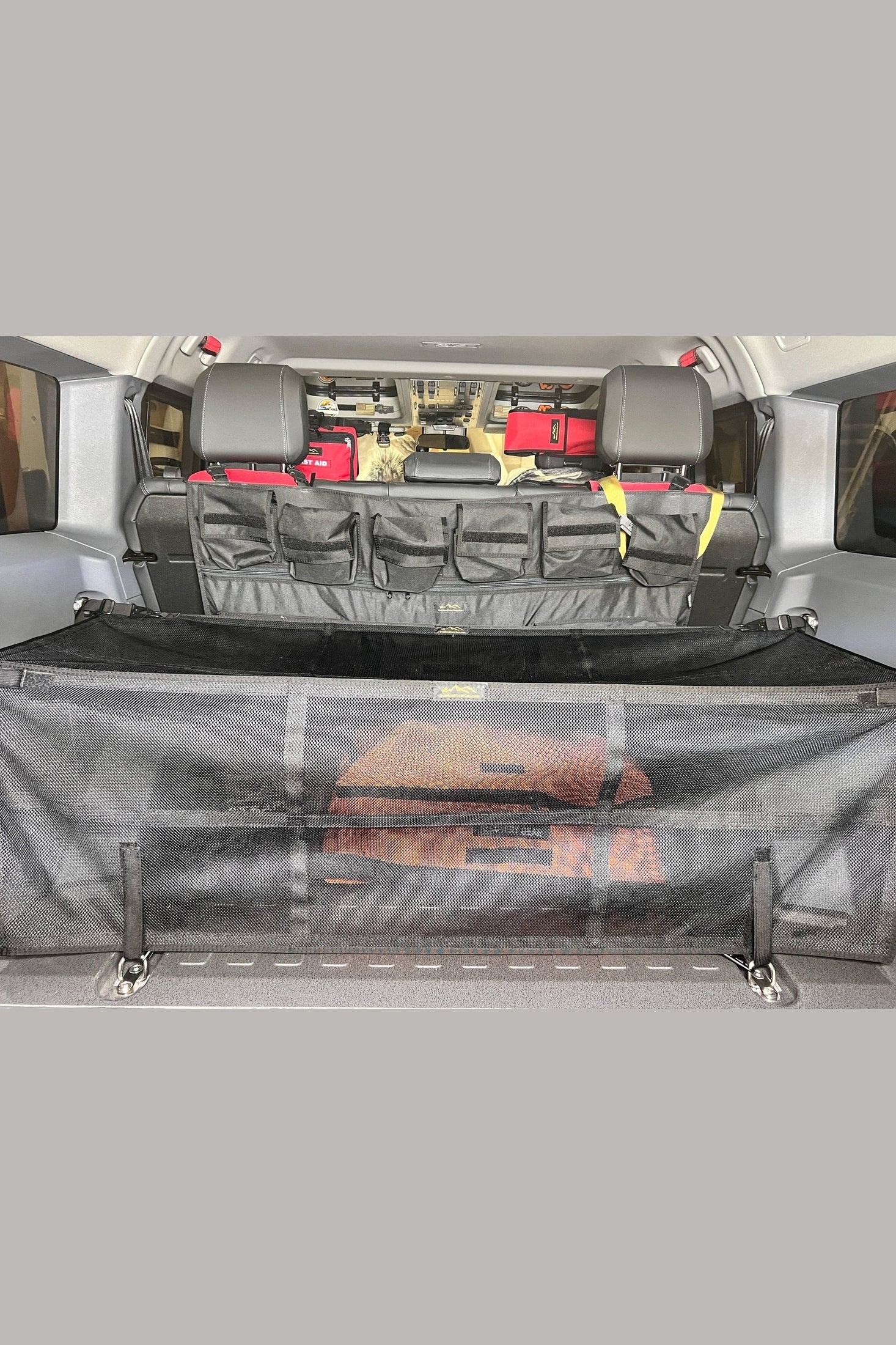Organize Your Gear with INEOS Grenadier Cargo Nets - Keep Your Vehicle Tidy and Ready for Adventure