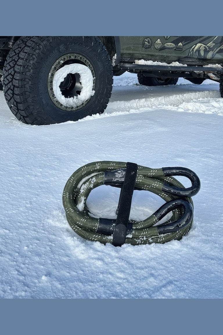 Kinetic-X Recovery Rope on snow, showcasing its durability and reliability in challenging terrains.