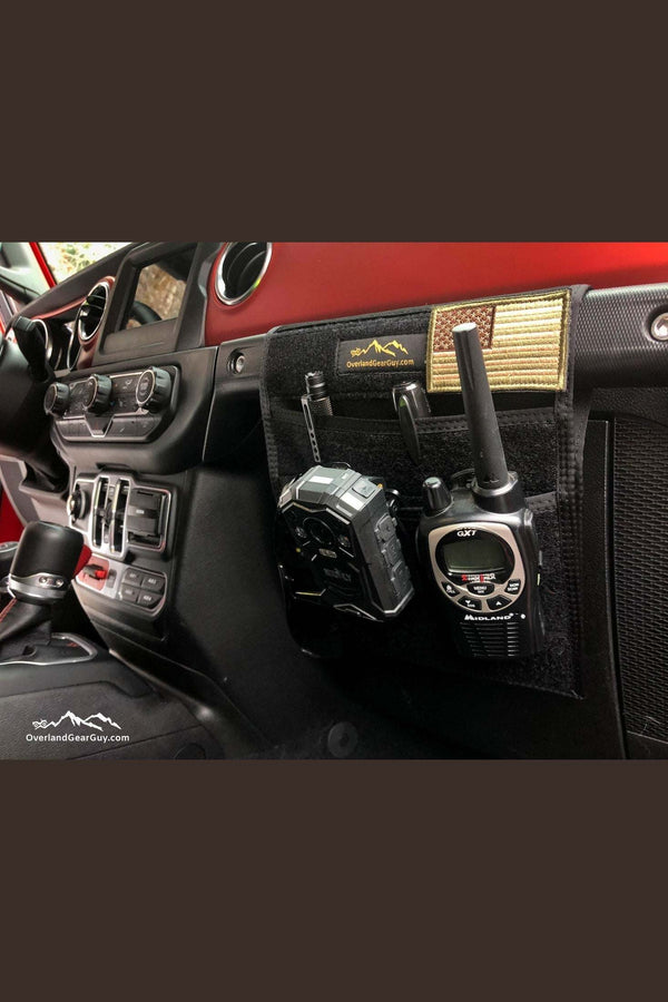 Jeep grab handle flat pocket attached inside Jeep with radios and patches