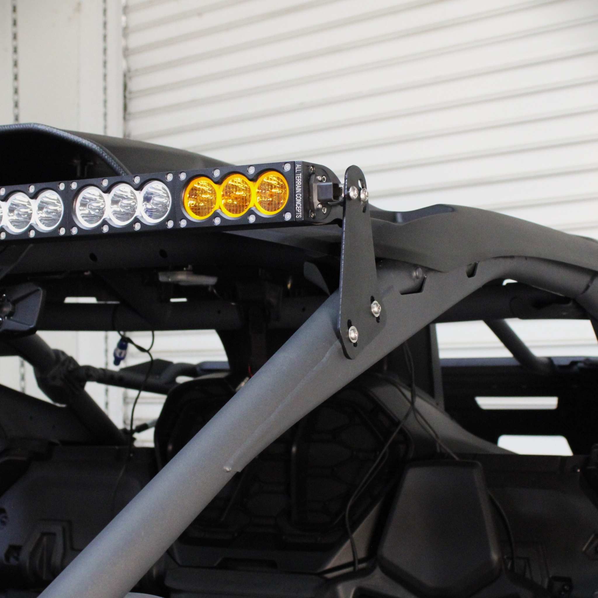 Can-Am Maverick R bracket mounting 50-inch light bar with adjustable black powder-coated hardware set of 2