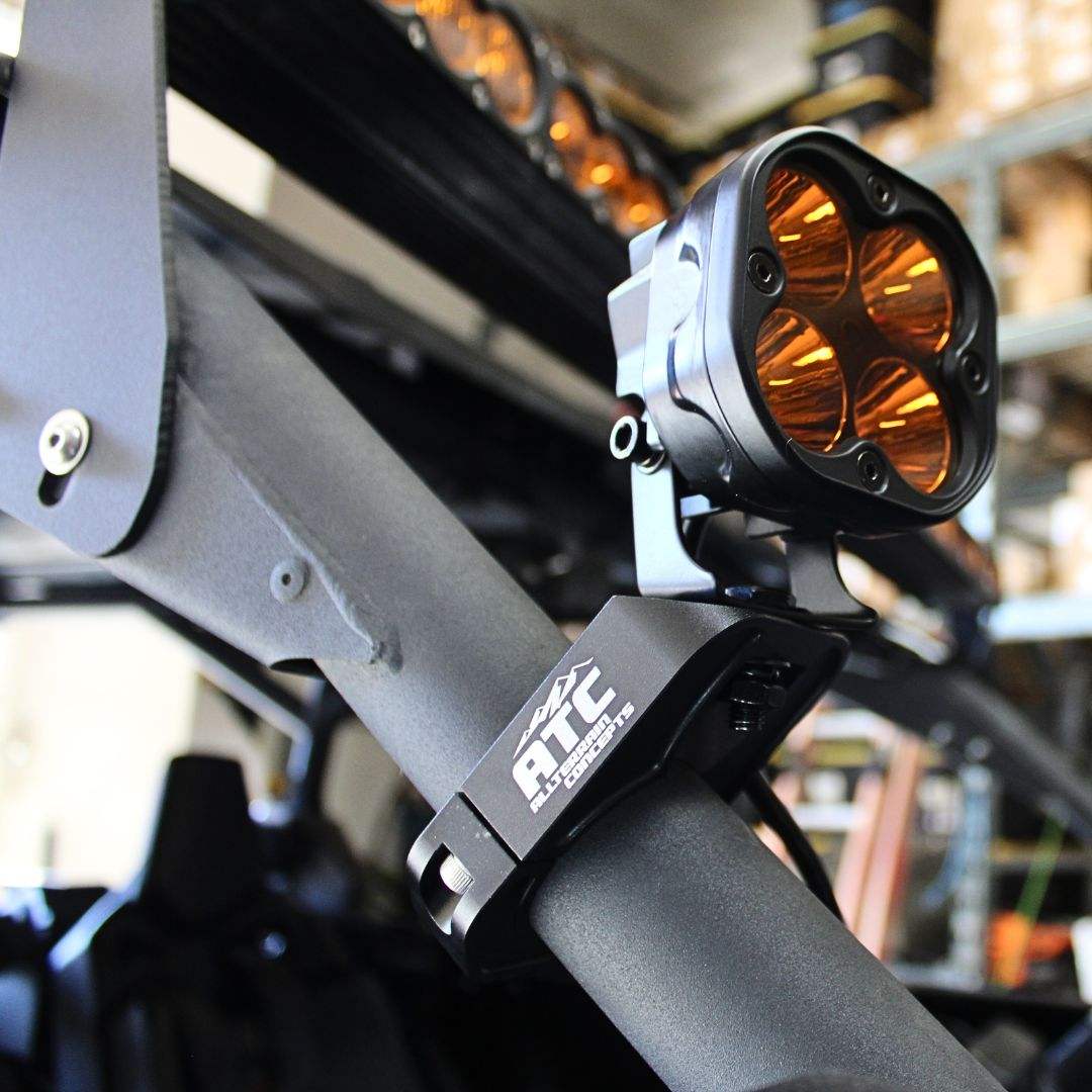 Billet A-Pillar Mounts black anodized aluminum pair mounted on vehicle roll cage with light pod bracket