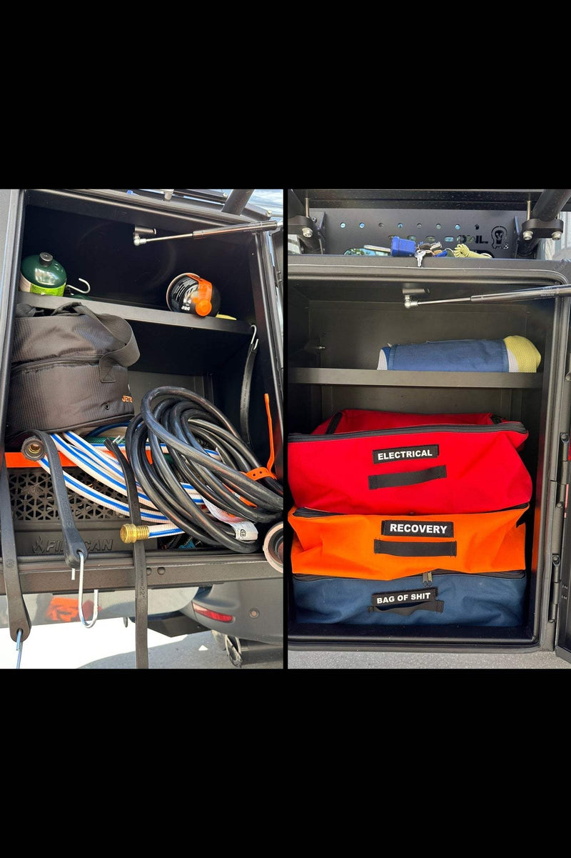 Expedition Box-Large Divider Storage Bags organized in vehicle storage compartments, red and orange labeled bags with durable construction and 3-sided zipper access.