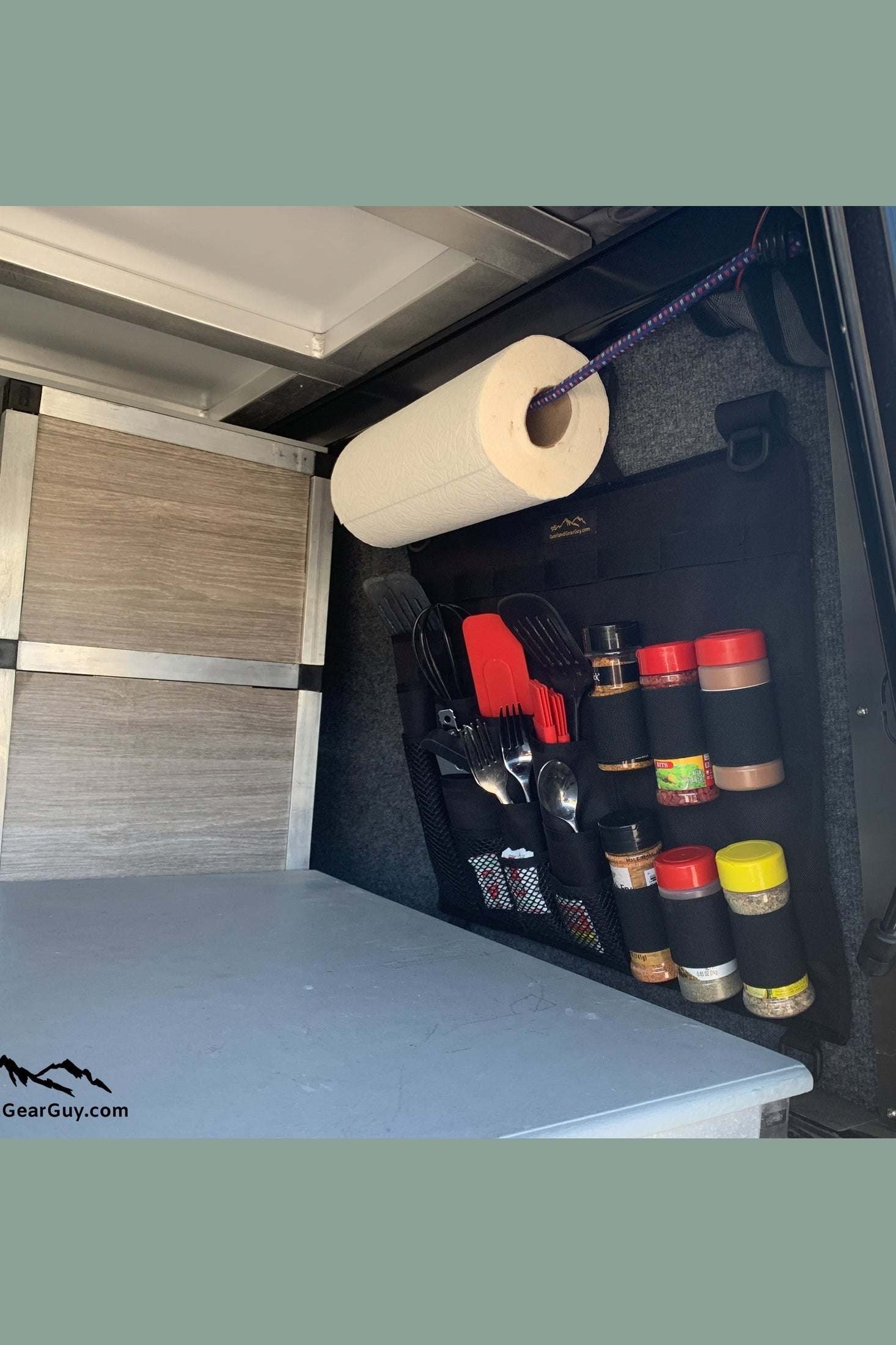 Wasatch Utensil Organizer displayed in a camp kitchen, storing utensils and spices efficiently.