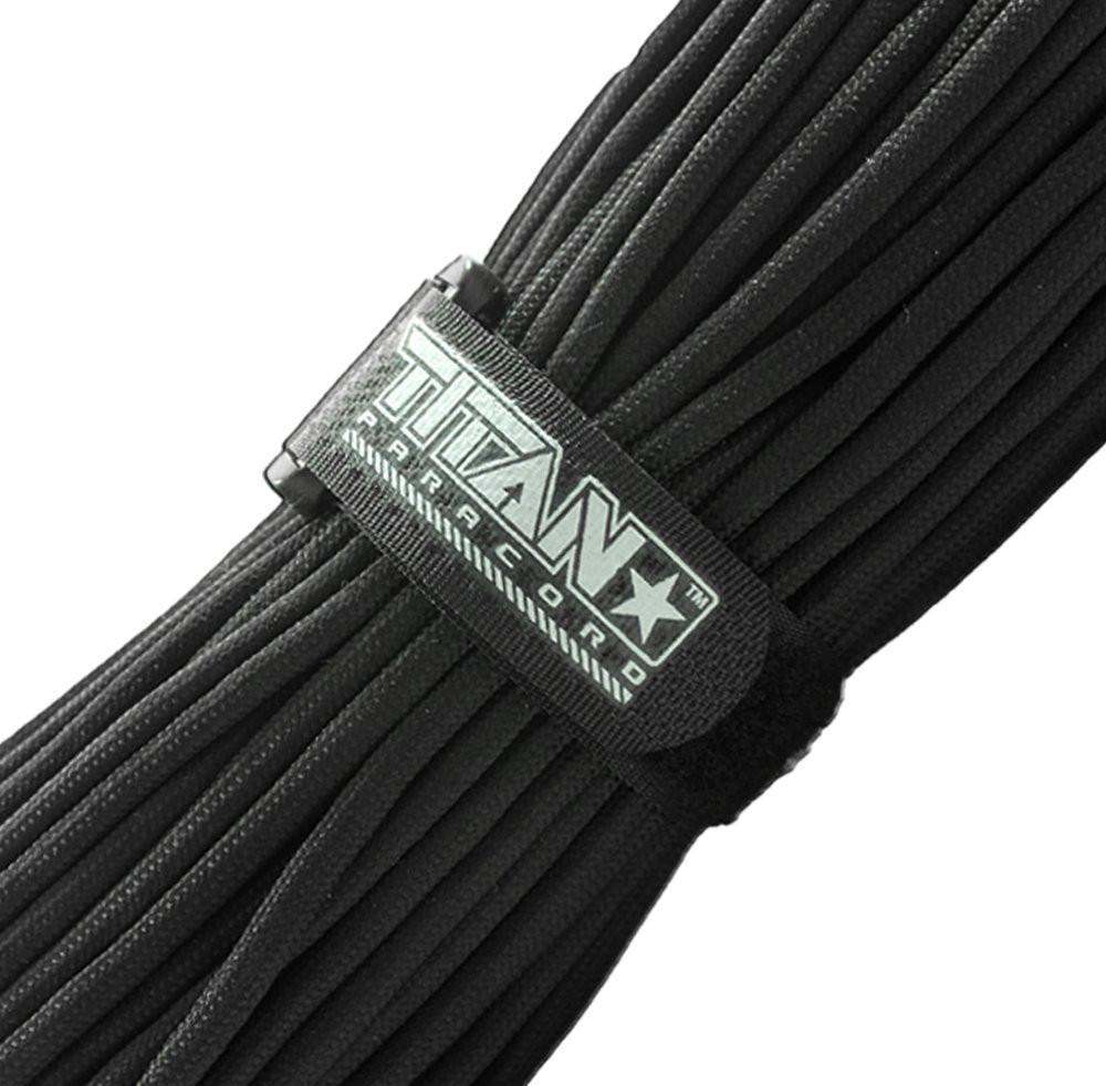 Black paracord bundle secured with TITAN Survival hook and loop fastener for organization.