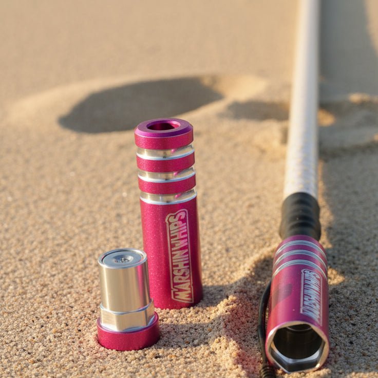 Game Changer Malibu Barbie Pink off-road whip with durable magnetic base and bright LEDs in sand